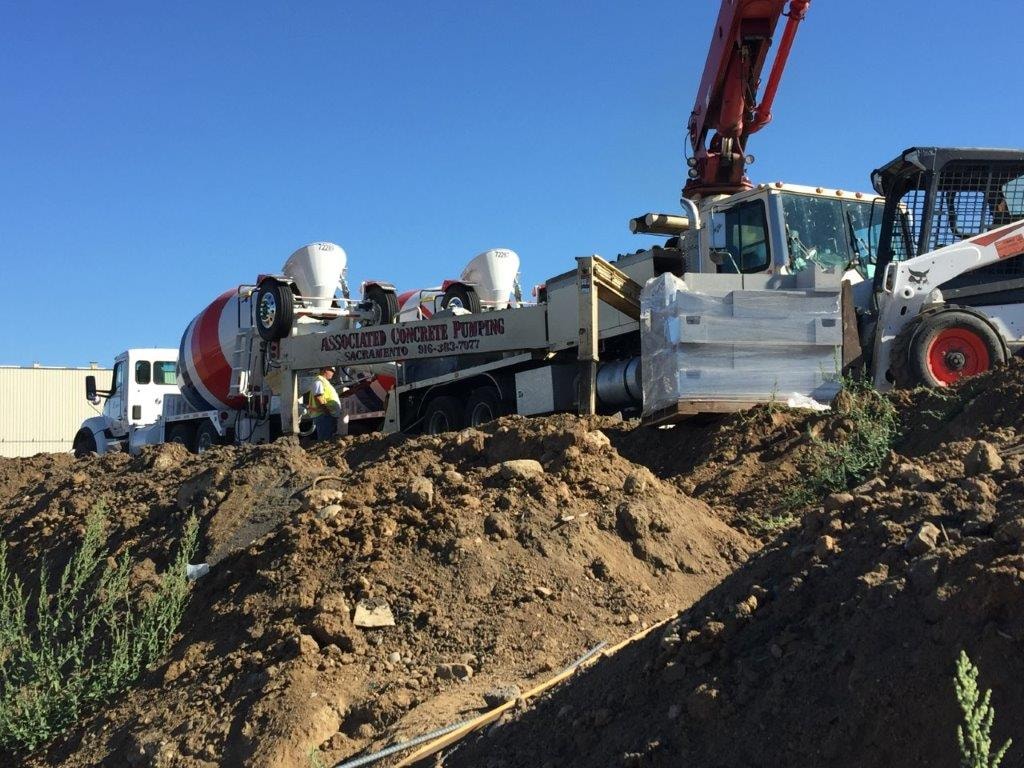 Concrete mixer and pump truck on NorCal Masonry commercial project