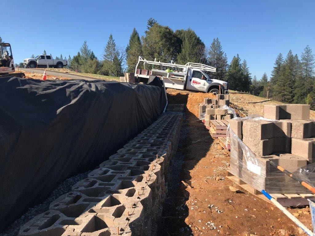 Protto II concrete block and drainage membrane installation